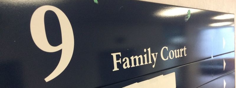 mckenzie friends family court sign